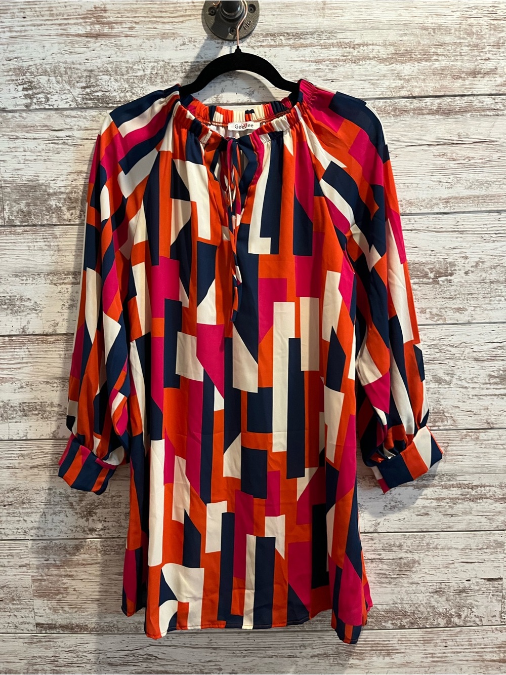 Geometric Midi Dress with Tie Neck in Navy, Orange & Pink